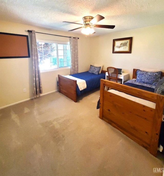 6333 Crestmore St, Bakersfield, CA 93308 - carpeted bedroom featuring a textured ceiling, baseboards, and ceiling fan