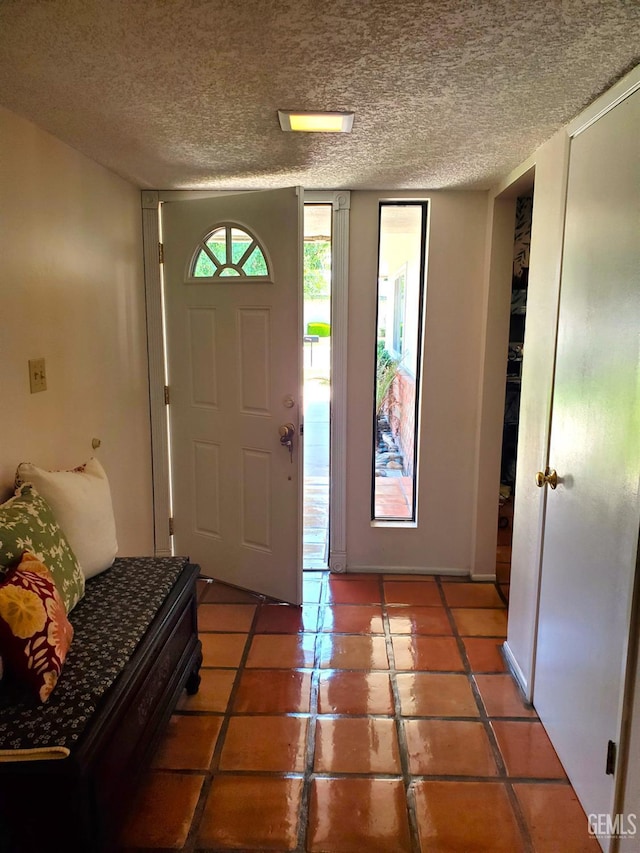 6333 Crestmore St, Bakersfield, CA 93308 - foyer with a textured ceiling and light tile patterned floors