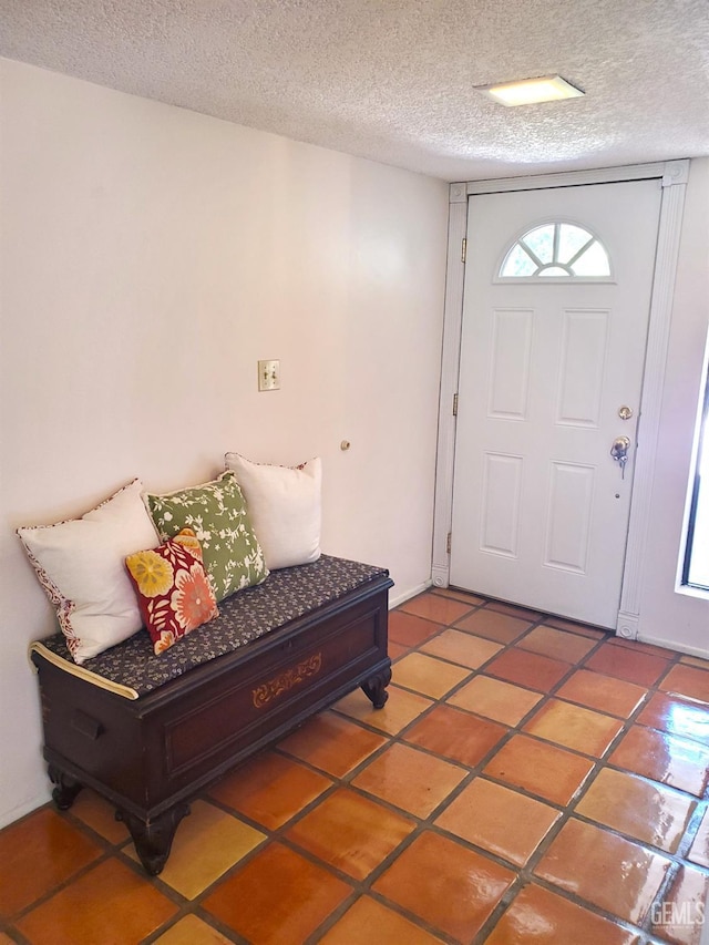 6333 Crestmore St, Bakersfield, CA 93308 - entrance foyer featuring a textured ceiling and light tile patterned flooring