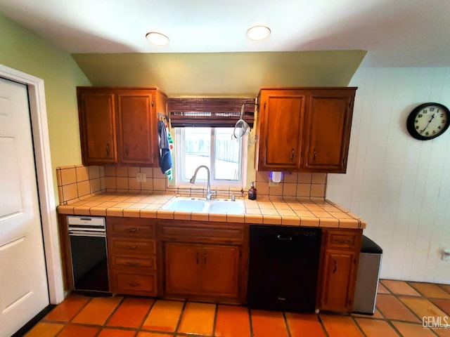 6333 Crestmore St, Bakersfield, CA 93308 - kitchen with a sink, tile countertops, tasteful backsplash, and brown cabinets