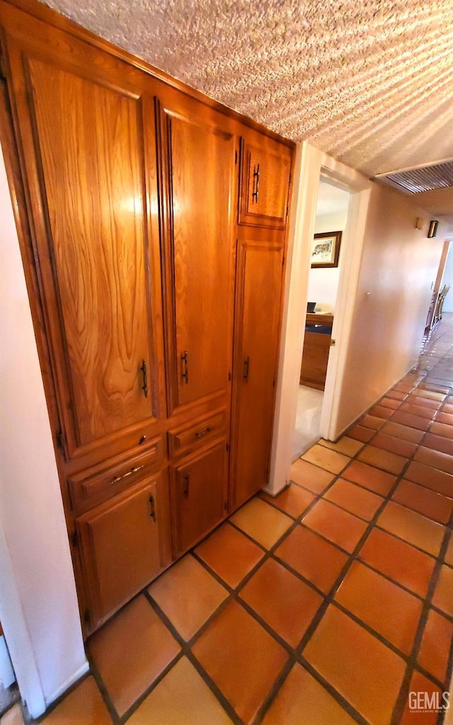6333 Crestmore St, Bakersfield, CA 93308 - hall featuring light tile patterned floors