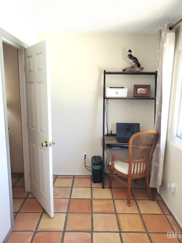 6333 Crestmore St, Bakersfield, CA 93308 - home office featuring a textured ceiling and light tile patterned flooring