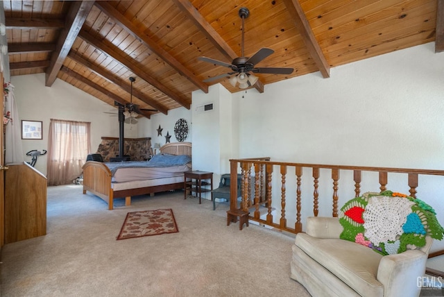 carpeted bedroom featuring beamed ceiling, a wood stove, high vaulted ceiling, and wood ceiling