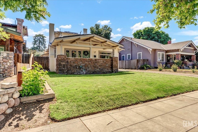 930 S Roosevelt Ave, Fresno, CA 93728 - view of front of home with stone siding and stucco siding