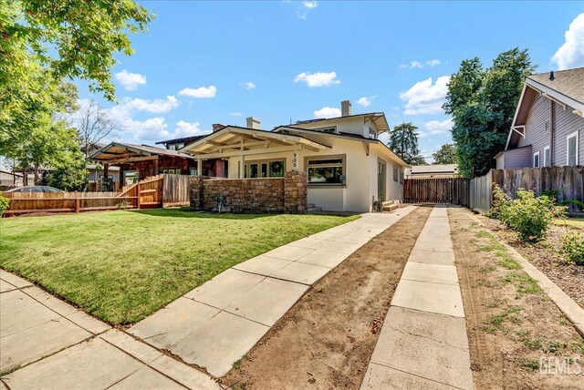 930 S Roosevelt Ave, Fresno, CA 93728 - view of front of house featuring stucco siding and stone siding