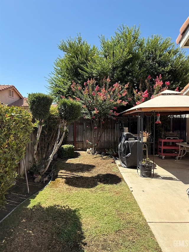 3910 Mariana Way, Bakersfield, CA 93311 - fenced backyard with a gazebo and a patio