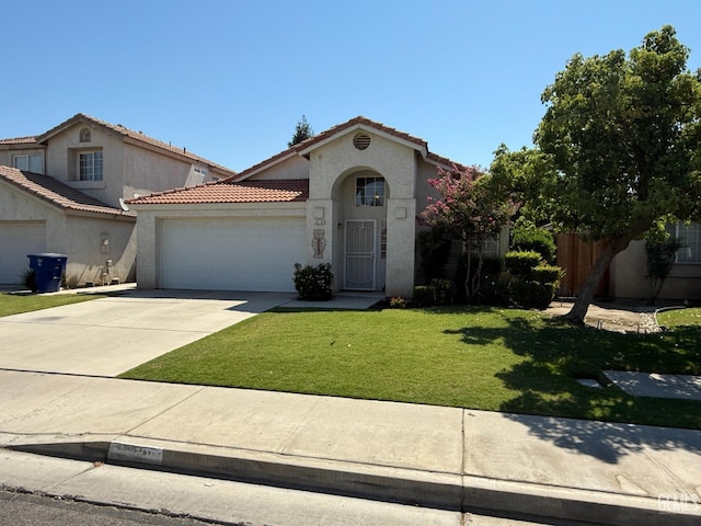 3910 Mariana Way, Bakersfield, CA 93311 - mediterranean / spanish home with a garage, a tile roof, stucco siding, concrete driveway, and a front lawn