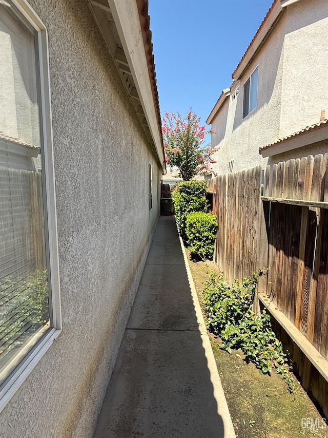3910 Mariana Way, Bakersfield, CA 93311 - view of property exterior with stucco siding and a tiled roof