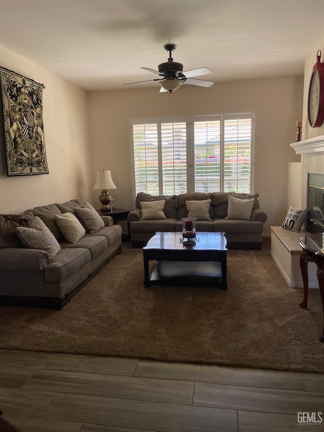 10011 Rosebud Ave, Bakersfield, CA 93311 - living area featuring a ceiling fan, plenty of natural light, and a fireplace