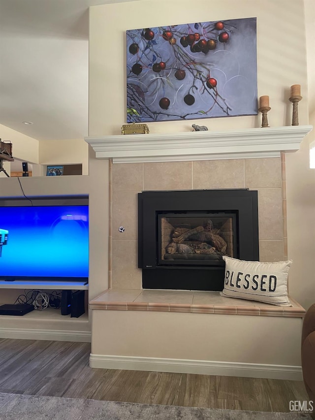 10011 Rosebud Ave, Bakersfield, CA 93311 - detailed view of wood finished floors and a fireplace