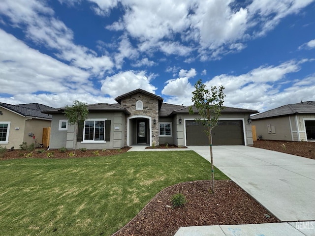 11022 Irontooth Ave, Bakersfield, CA 93311 - view of front of home with stucco siding, an attached garage, driveway, and stone siding