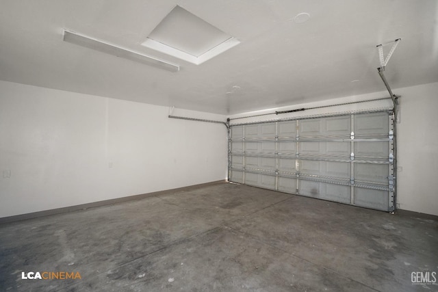 200 Minner Ave, Bakersfield, CA 93308 - garage featuring baseboards