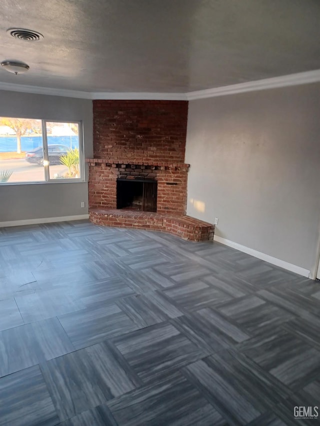 unfurnished living room with a fireplace, a textured ceiling, and ornamental molding