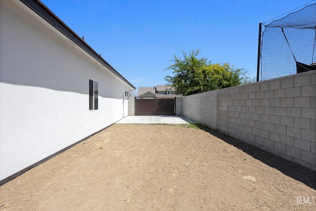 205 Goertzen Ave, Shafter, CA 93263 - fenced backyard featuring a patio area