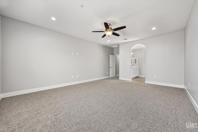 205 Goertzen Ave, Shafter, CA 93263 - spare room featuring ceiling fan, arched walkways, light carpet, and recessed lighting