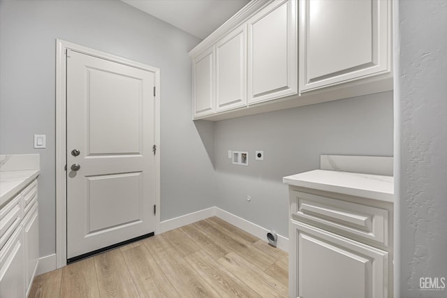 205 Goertzen Ave, Shafter, CA 93263 - laundry room featuring electric dryer hookup, cabinet space, light wood-style flooring, and hookup for a washing machine