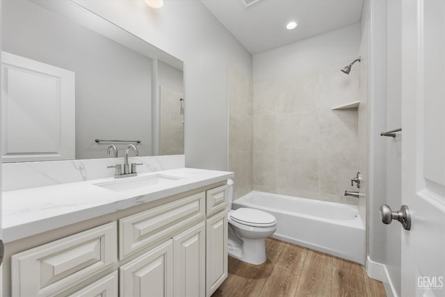 205 Goertzen Ave, Shafter, CA 93263 - full bathroom featuring vanity, wood finished floors, shower / bath combination, and recessed lighting