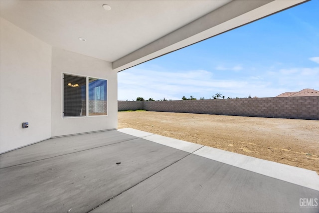 205 Goertzen Ave, Shafter, CA 93263 - fenced backyard with a patio area