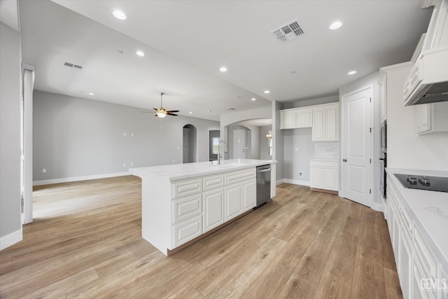 205 Goertzen Ave, Shafter, CA 93263 - kitchen with stainless steel appliances, arched walkways, a ceiling fan, light wood-type flooring, and recessed lighting