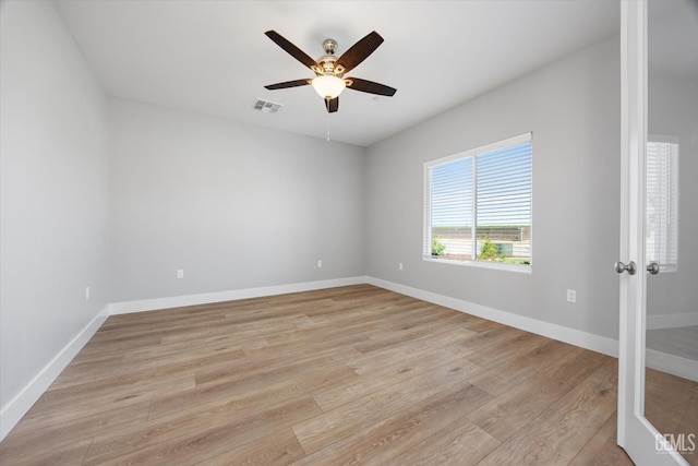 205 Goertzen Ave, Shafter, CA 93263 - empty room with a ceiling fan and light wood-style flooring
