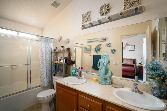 1701 San Jose Ave, Wasco, CA 93280 - bathroom featuring bath / shower combo with glass door, double vanity, toilet, and vaulted ceiling