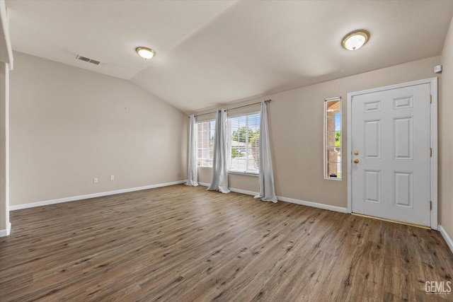 5502 Veneto St, Bakersfield, CA 93308 - entryway with wood finished floors, vaulted ceiling, and baseboards