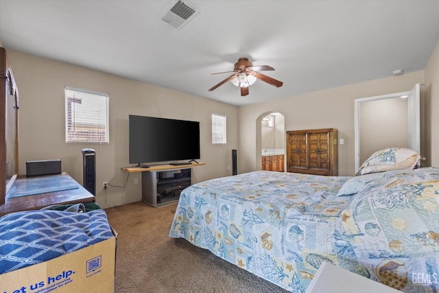 5502 Veneto St, Bakersfield, CA 93308 - bedroom featuring carpet floors, a ceiling fan, and arched walkways