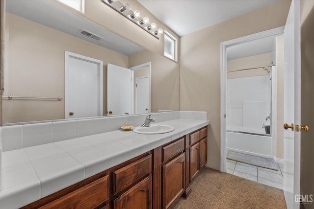 5502 Veneto St, Bakersfield, CA 93308 - full bath featuring vanity, shower / washtub combination, and tile patterned flooring