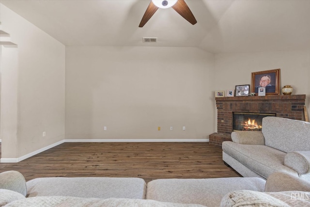 5502 Veneto St, Bakersfield, CA 93308 - living room featuring wood finished floors, a ceiling fan, baseboards, a fireplace, and lofted ceiling