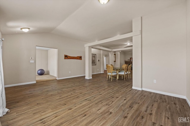 5502 Veneto St, Bakersfield, CA 93308 - living room featuring wood finished floors, lofted ceiling, and baseboards