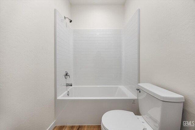 135 L St, Bakersfield, CA 93304 - full bath with wood finished floors and shower / bathtub combination
