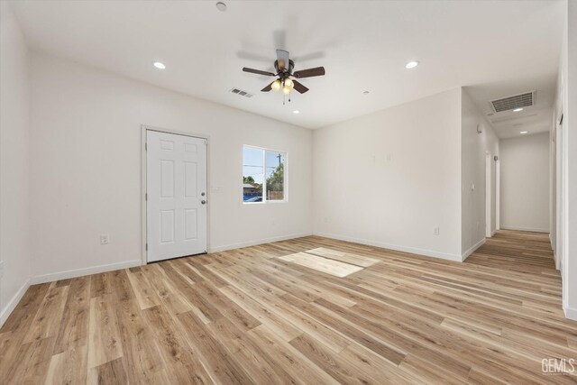 135 L St, Bakersfield, CA 93304 - unfurnished room with ceiling fan, recessed lighting, and light wood-type flooring