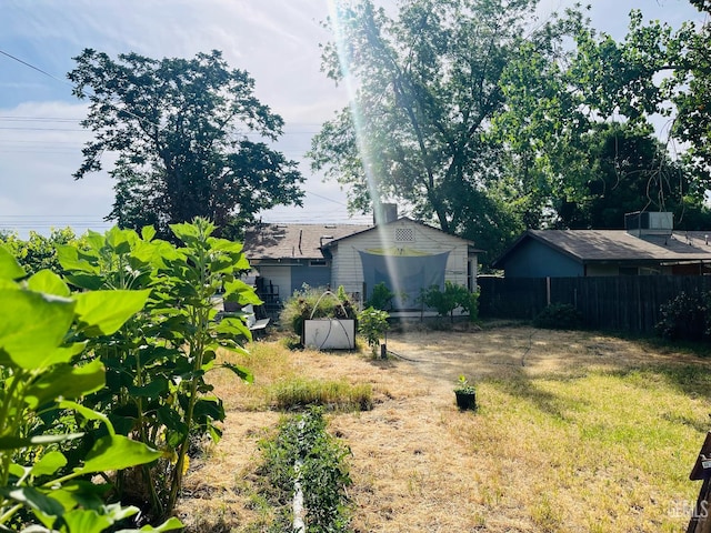 323 A St, Bakersfield, CA 93304 - view of yard featuring fence