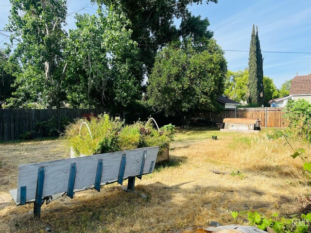 323 A St, Bakersfield, CA 93304 - view of yard with fence