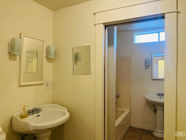 323 A St, Bakersfield, CA 93304 - bathroom with tile patterned floors and a sink
