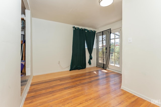 5435 Rd 37, Alpaugh, CA 93201 - spare room featuring wood finished floors and baseboards