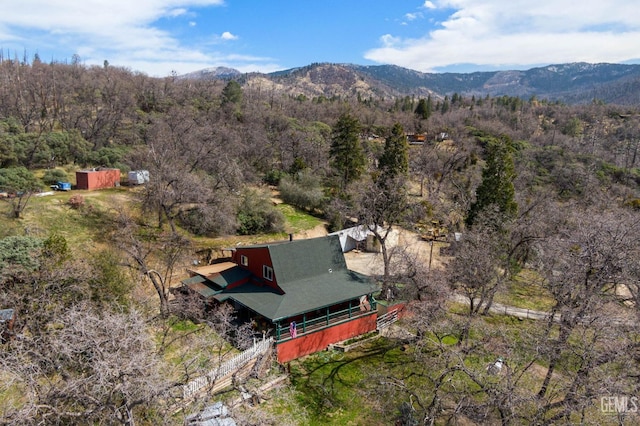 45071 Forest Dr, Posey, CA 93260 - back of property featuring roof with shingles, a garden, a gambrel roof, fence, and a lawn