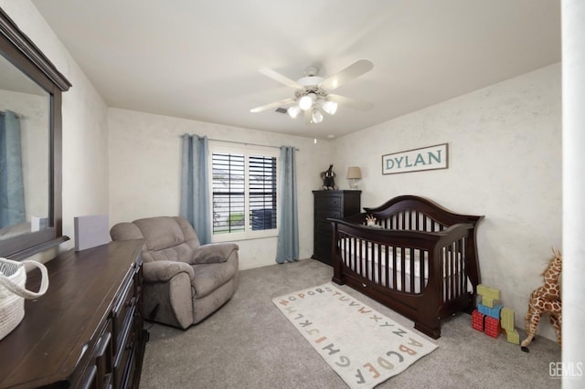 carpeted bedroom featuring ceiling fan