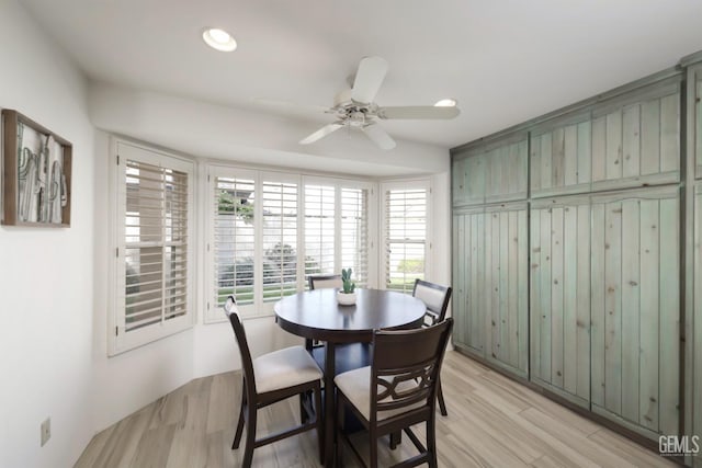 dining room featuring a ceiling fan, recessed lighting, and light wood finished floors