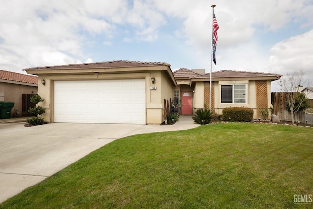 view of front of house featuring a front yard and a garage