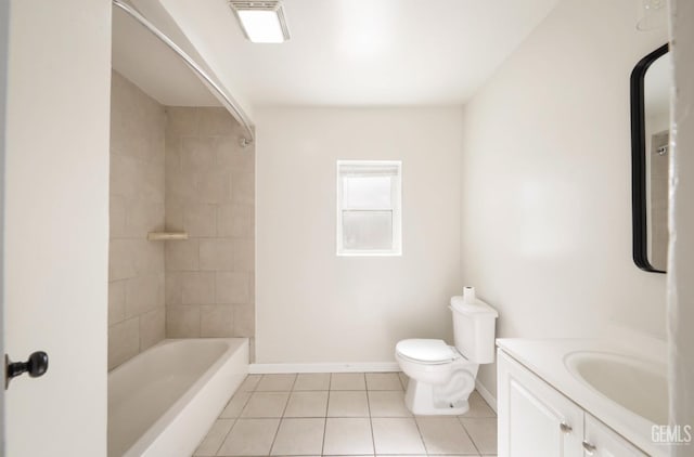 719 Washington Ave, Bakersfield, CA 93308 - full bathroom with tile patterned flooring, baseboards, toilet, vanity, and bathtub / shower combination