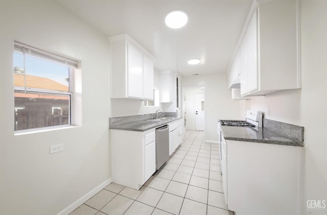 719 Washington Ave, Bakersfield, CA 93308 - kitchen with baseboards, dishwasher, a sink, and white range with gas stovetop