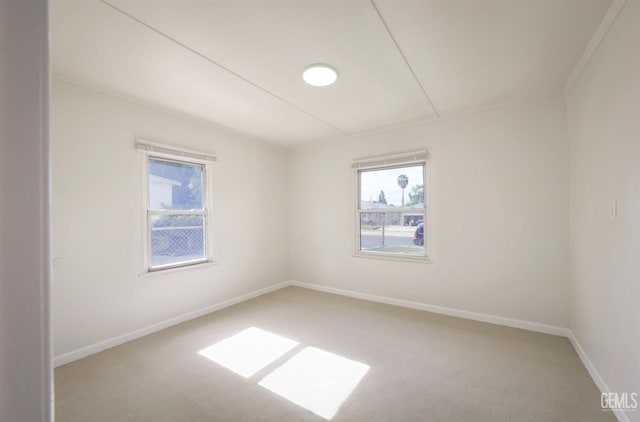 719 Washington Ave, Bakersfield, CA 93308 - unfurnished room with carpet and baseboards