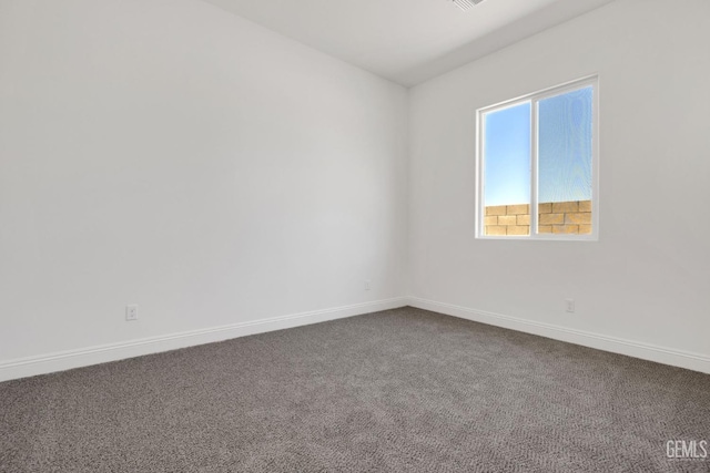 empty room featuring carpet floors