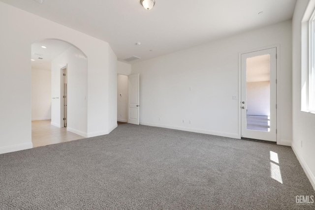 view of carpeted spare room