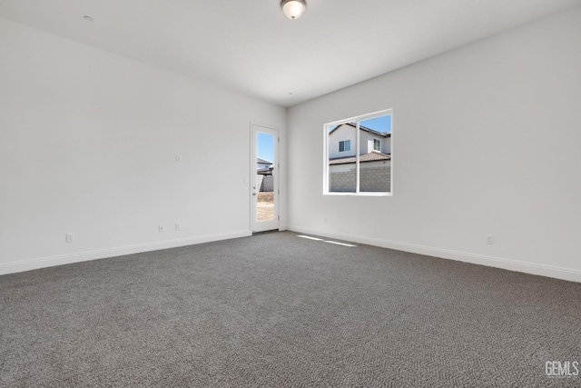 unfurnished room featuring carpet flooring