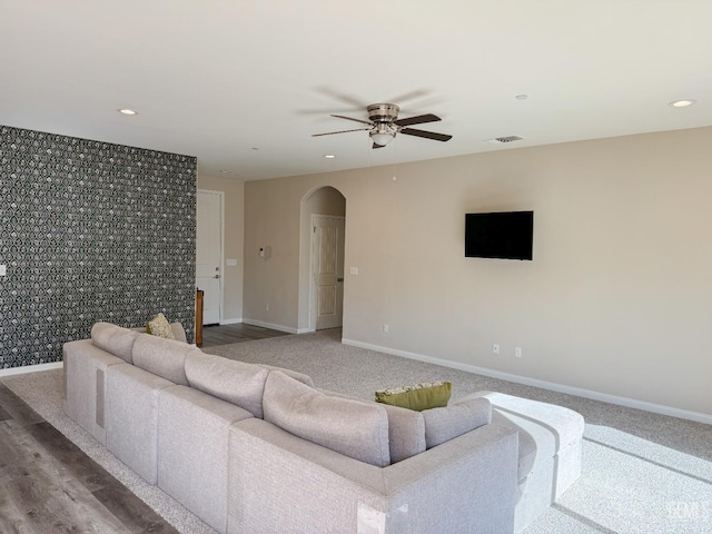 living room with ceiling fan