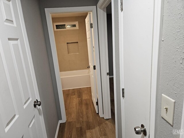 unfurnished room featuring dark hardwood / wood-style flooring