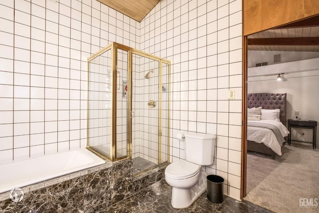 bathroom with independent shower and bath, tile walls, and toilet