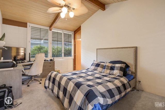 carpeted bedroom with lofted ceiling with beams and ceiling fan